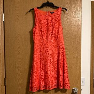 Sleeveless red-orange A-line dress